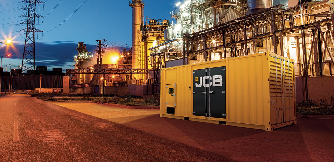 Yellow JCB shipping container in an industrial area
