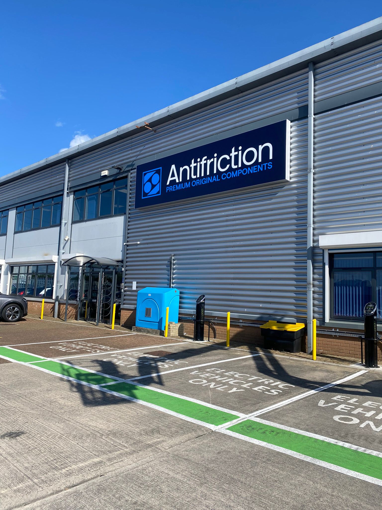 Front of Antifriction offices and warehouse in the sun